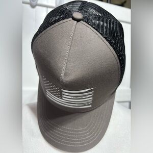 NWOT Amazon flag brown/back trucker hat